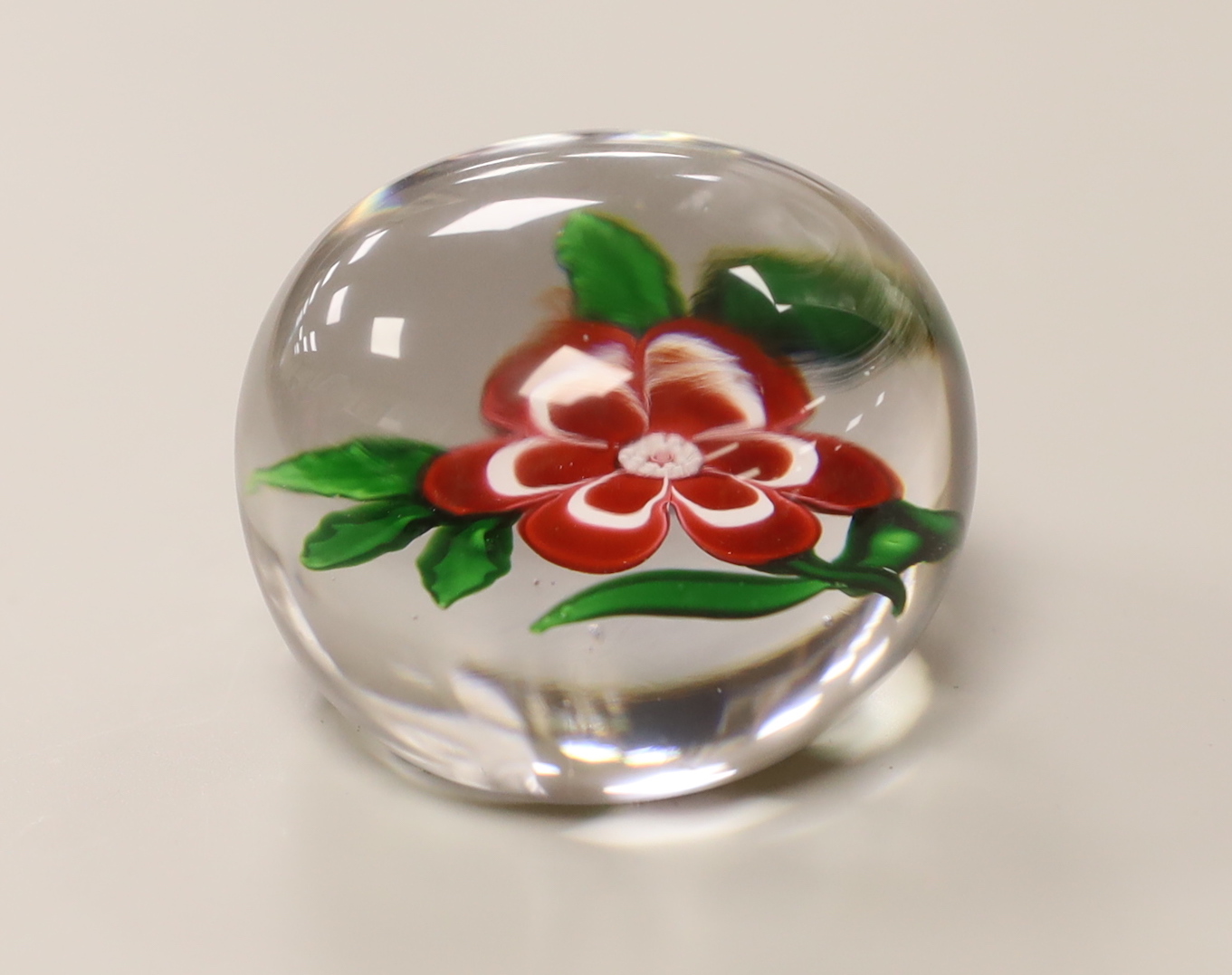 A Baccarat primrose paperweight, approximately 5cm diameter